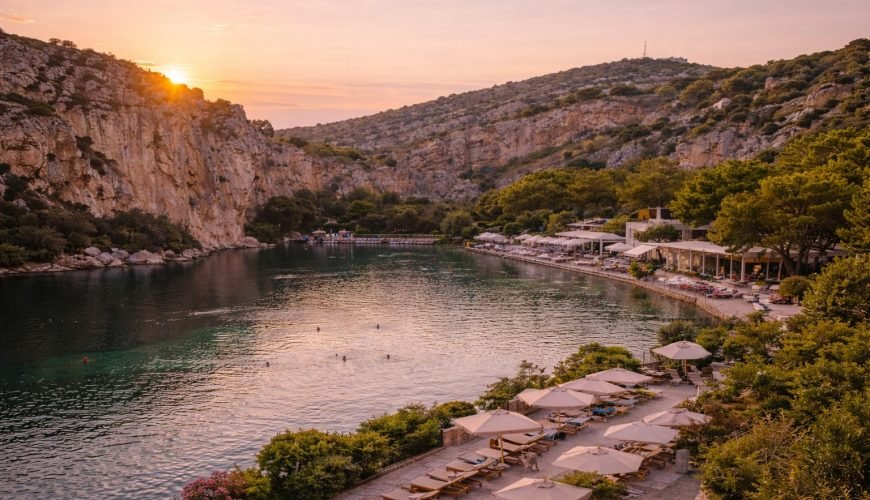 Lake Vouliagmeni on the Athenian Riviera at golden hour, a serene coastal escape beyond central Athens.
