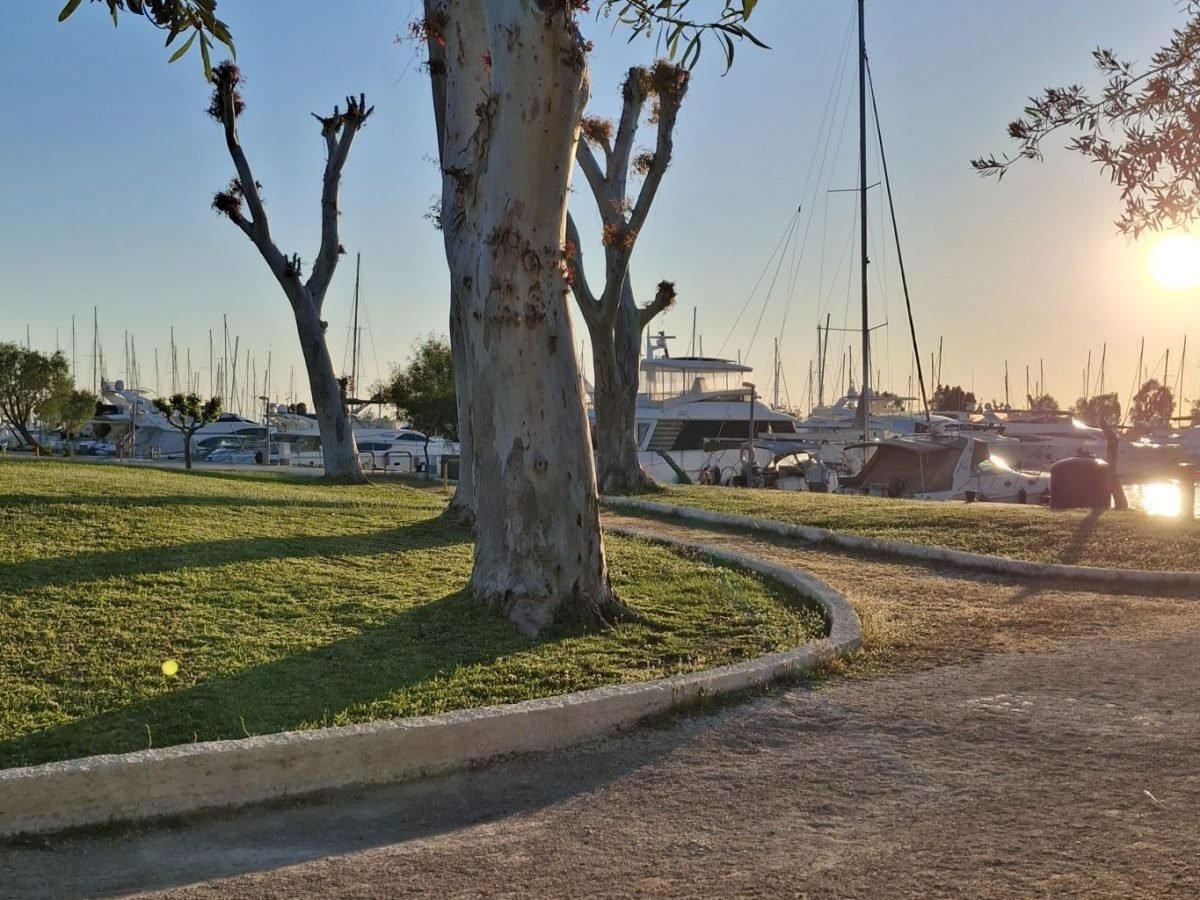 Sunset path near the Athens Riviera marina, reflecting a slower way to experience Athens.