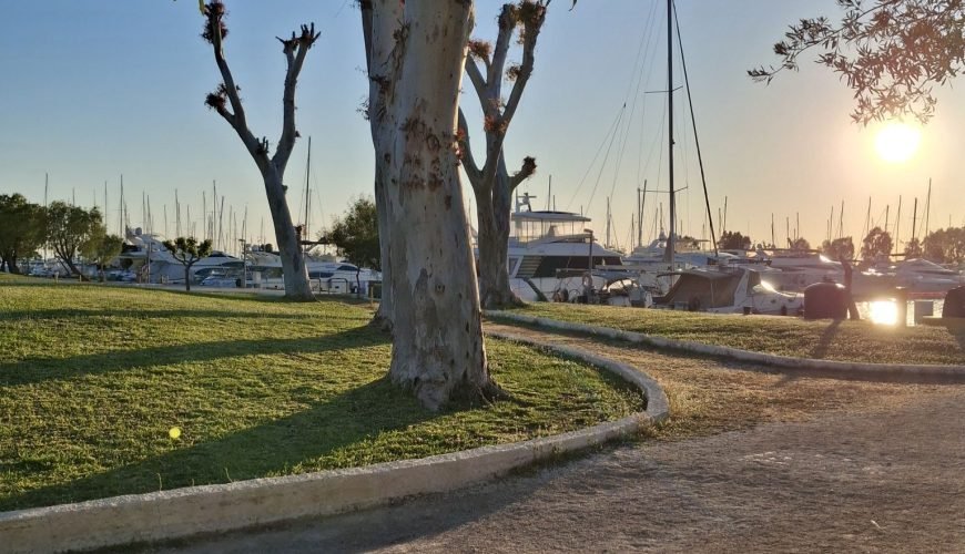 Sunset path near the Athens Riviera marina, reflecting a slower way to experience Athens.