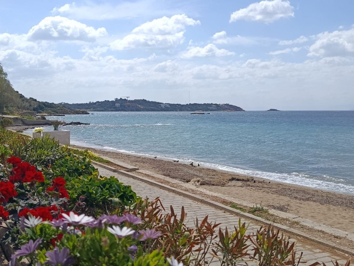 Athens Riviera coastline with flowers and summer sea views